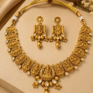 Aaradhya Lakshmi Temple Necklace Set with antique gold motifs and matching earrings