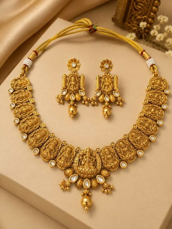 Aaradhya Lakshmi Temple Necklace Set with antique gold motifs and matching earrings