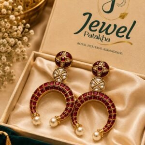 Ruhani Ruby Heritage Chandbali Earrings with pearl drops displayed in JewelPatakha luxury jewellery box