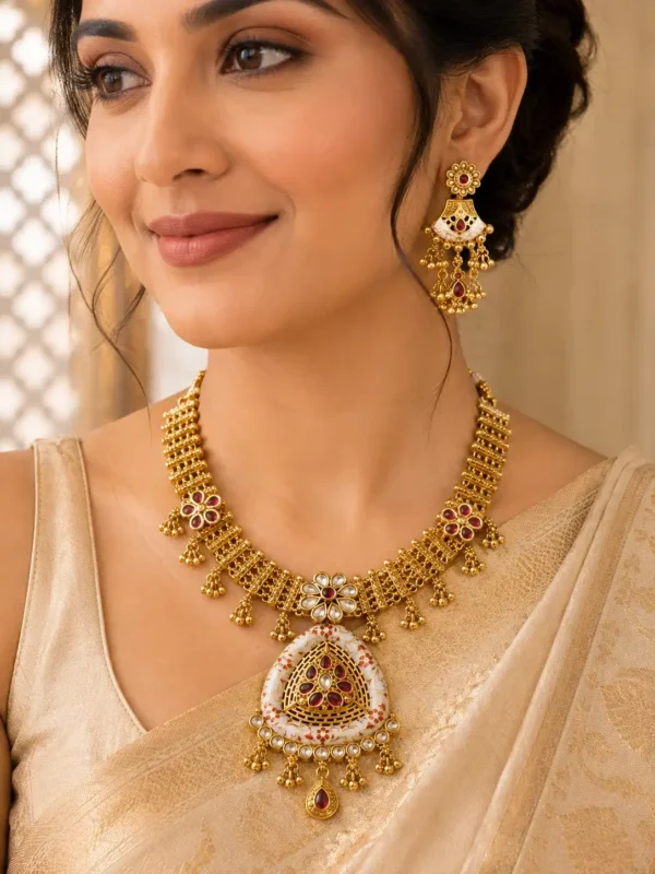 Close-up of Rajshree Heritage Necklace Set with ruby stones and white detailed pendant